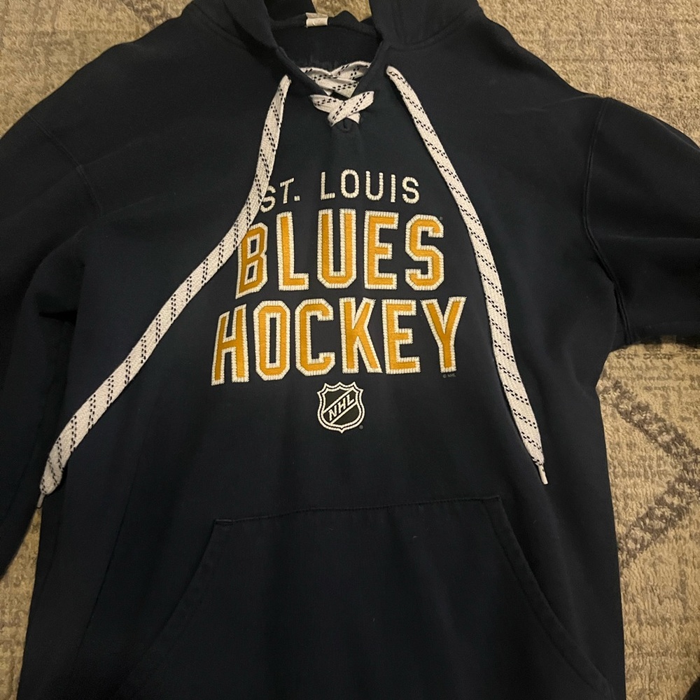 St. Louis blues hockey sweatshirt, large.